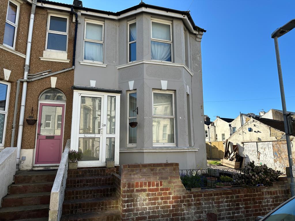 Lot: 146 - THREE-BEDROOM END-TERRACE HOUSE FOR REFURBISHMENT - External picture of an end of terrace property